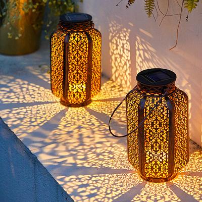 China Holiday Decoration Trailing Hand Solar Leaf Metal Skeleton Lantern Hollow Light Shade Outdoor Patio Yard for sale