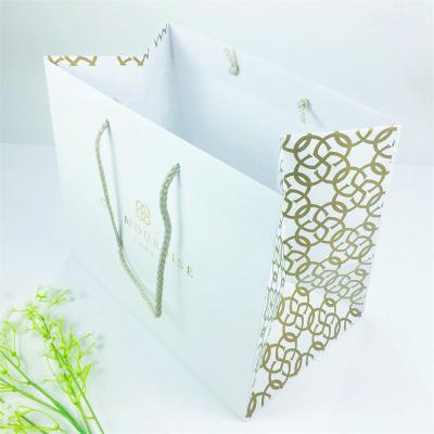 China Fashionable Eco-friendly Glod Hot Stamp Printing Paper Bag Luxury Low Wide Handmade Fabric Tote Shopping Bags for sale