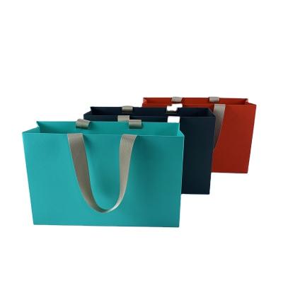 China Fancy Paper Shopping Colorful Embossed Tote Bag Tote Retail Carry Boutique Personalized Euro Luxury Custom Wholesale Eco-Friendly Printing for sale