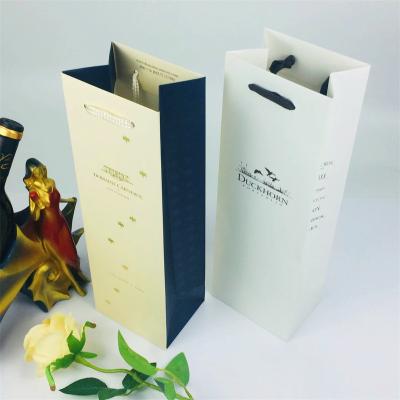 China Wholesale High Quality Reusable Wine Packaging Rack Up Wine Gift Paper Bag Competitive Price Hot Sale Craft Paper Bag for sale