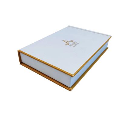 China Recyclable High Quality New Arrivals Book Shape Paper Gift Box Texture Embossing Rigid White Paper Packaging Box With Gold Foil Logo for sale