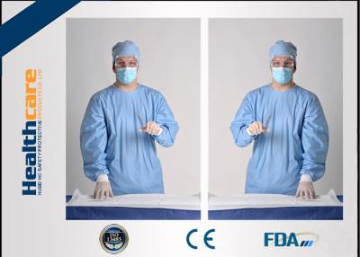 China Vestidos no tejidos de los vestidos protectores disponibles estéril con el azul médico hecho punto del puño en venta