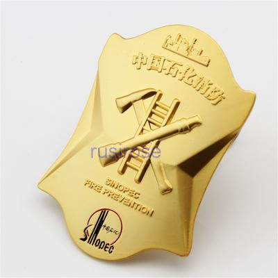 China Fire safety reward badge made to order, matte gold metal badges made to order, fire brigade badges for sale