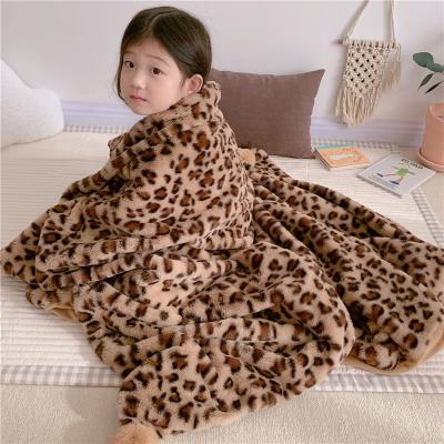 China Leopard Pattern Print Anti-Static High Grade Printed Wholesale Kids Fleece Blankets With Pompoms for sale