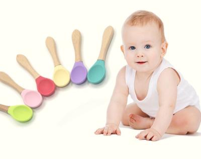 China BPA Free Stocked Bamboo Wooden Utehsils Baby Kids Silicone Wooden Training Spoon for sale