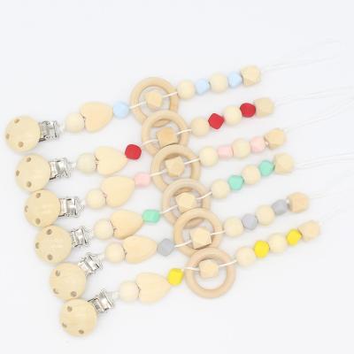 China BPA Free Hot Sell baby pacifier holders chain organic wooden teether pacifier clip for sale