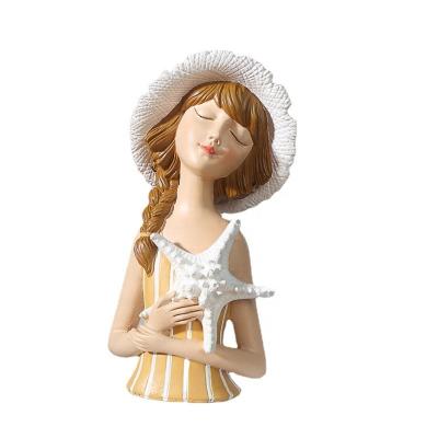 China Unique Popular Handmade Carved Shell Girls Stand on Resin Material Table Ornament Decorations for Indoor Home Decorations for sale