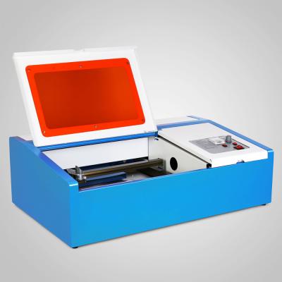 China Laser Engraving Desktop 40w Mini Rubber Stamp Co 2 Small Laser Engraving Cutting Machine for sale