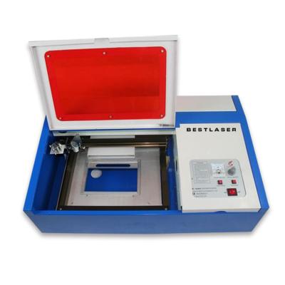 China Laser Engraving Small Size 300x420mm Mini Affordable Laser Tabletop Engraving Machine for sale