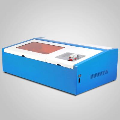 China Laser Engraving 40w 50w Mini Cheap CO2 Laser Engraving Machine Stamp For Small Crafts Business for sale