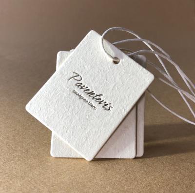 China Custom luxury hanging label special shape shake paper hanging label for sale