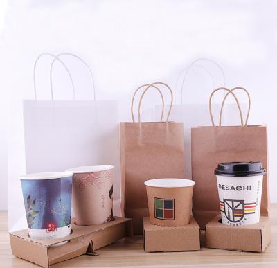 China Manufacture Direct Cheap Customized logo Stock Gift white Paper Carry Bags With Handles for Shopping for sale