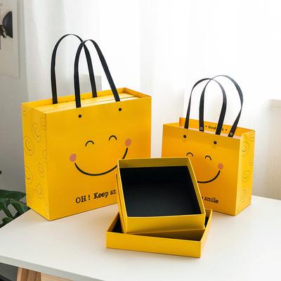 China OEM custom printing jewelry clothing retail luxury famous brand shopping paper gift bag with your own logo for sale