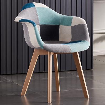 China Patchwork Design Manufacturer Sells 2021 Modern Nordic Kitchen Chair Design Patchwork Fabric Dining Chair With Wooden Leg for sale