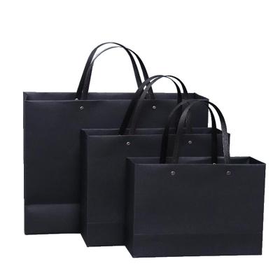 China Recycled Materials Customized Logo Hot Sale Fashion Black Luxury Shopping Gift Paper Bag With Handle for sale