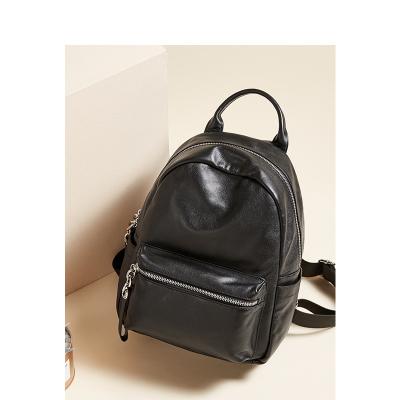 China Waterproof Hot Sale Women School Backpack Female Genuine Leather Bags Large Capacity for sale