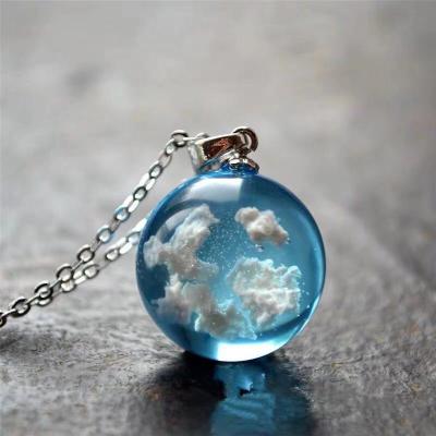 China Environmentally Friendly Women Girls Clouds Transpa Pendant Glass Ball In White Cloud Blue Sky Pendent Starry Necklace for sale