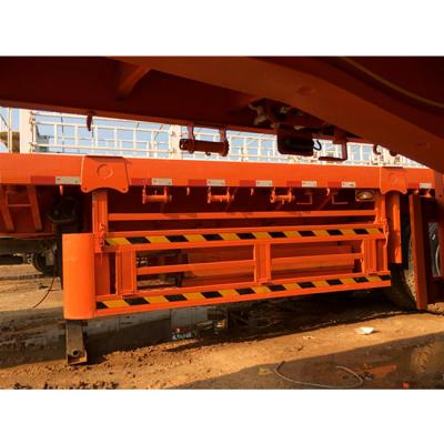 China Truck Trailer 30 Ton 50 Ft Flatbed Bogie 20ft 40ft 60ft Flat Bed Container Tandem Semi Trailer for sale