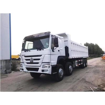 China Good Condition Cargo Sinotruck Howo Side Trailer 8X4 336 Hp Tipping Semi Dumper 50 Ton Used Dump Truck > 8L for sale