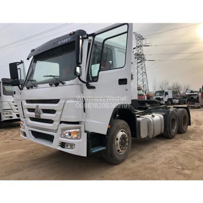 China Low Price Chinese Best Selling Sinotruk HOWO 6X4 Tractor Truck 30 Ton 6X4 10 Tires Used Chinese HOWO In Africa 6800*2496*2958 for sale