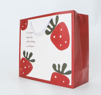 China Recycled Materials Gift Bag Present Document Bag Wedding Package Box Favors Birthday Party Pajamas Clothes Paper Packaging Bag for sale