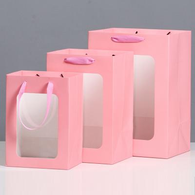 China Recycled Materials Bouquet Portable Wrapping Flower Wrapping Paper Gift Waterproof Clear Paper Bag With Clear Window for sale