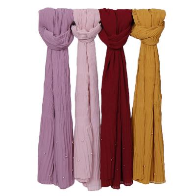 China Long Solid 16 Color Woven Hijab Pearl Scarf Ruffled Pearl Chiffon Skirt Striped Edge Wholesale Woven Hijab for sale