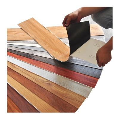 China Waterproof Luxury Wood Grain 2mm Skin And Stick Plastic Self Adhesive PVC Vinyl Plank Flooring for sale