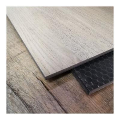 China Waterproof Fireproof PVC Tiles Lay Loose Lvt Vinyl Flooring With Multi Patterns for sale