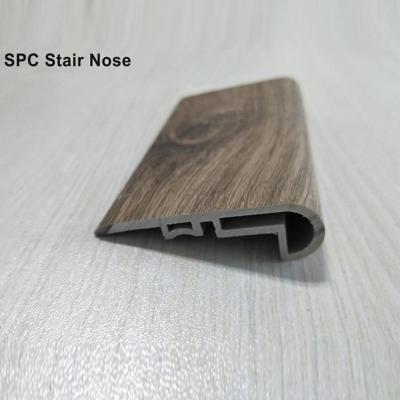 China Raincoat ; Fireproof Decoration Material Wooden Look Floor Skirting Board SPC Stair Nosing for sale