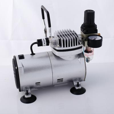 China Mental airbrush compressor with air tank for sale