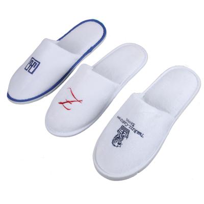 China EVA Wholesale One Time Use Make Logo Coral Velvet Coral Fleece Hotel Customized Unisex Slippers for sale