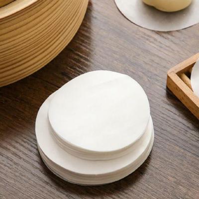 China Custom 8 Inch 100 Inch Waterproof Greaseproof Sheets Silicone Coated Round Non-stick Steaming Parchment Paper For Food for sale