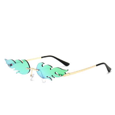 China New style European and American flame dance glass funny frameless sunglasses 2021 fashion irregular trend sunglasses for sale