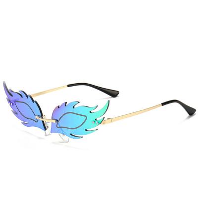 China Personalized New Fashion Sunglasses Fox Flame Feather Funny Fish Modeling Cross Mirror Trend Rimless Sunglasses for sale