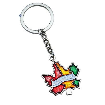 China Souvenir Gifts Promotion OEM Metal Keychain Custom Maple Leaf paint Keychain Transparent paint keychain for sale