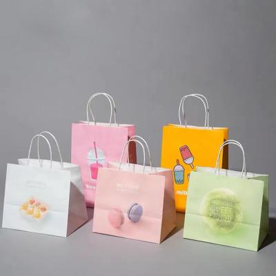 China Custom Recyclable Wholesale Custom Recyclable Kraft Paper Bag Logo Printed Gift Reusable Shopping Bag for sale