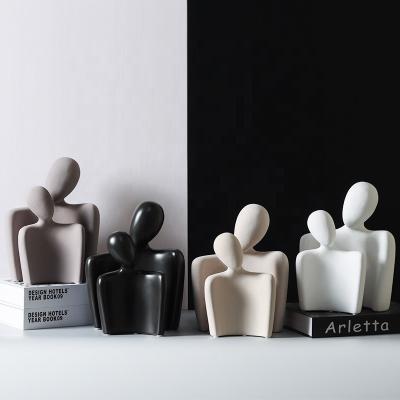 China Modern Nordic Abstract Ornaments Figures Embrace Ceramic Ornaments for sale