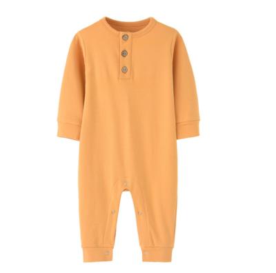 China Newborn Cotton Infant Clothes Solid Color Baby Dress Button Baby Overalls Long Sleeves Baby Romper for sale