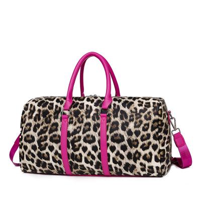 China Durable Hot Sale PU Hot Pink Leather Leopard Long Strap Outdoor Camping Women Duffel Travel Bag for sale