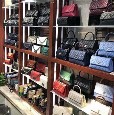 China Famous Brand Luxury Women's Handbags Motion Sensing Wholesale Price Cheap Chain Shoulder Bag Tote Bag for sale