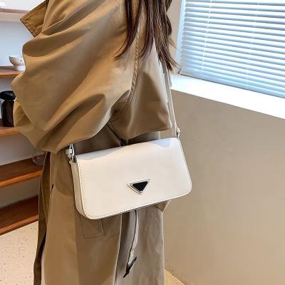 China Solid Color Luxury Women's Motion Sensing Brand Shoulder Leather Cross - Body Square Bags Designer Small Flap Zipper Handbag for sale