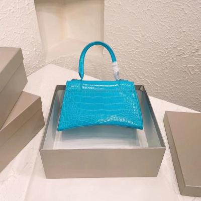 China Luxury famous brand women handbags motion sensing embossed leather wide purses and letter shoulder straps handbags for sale