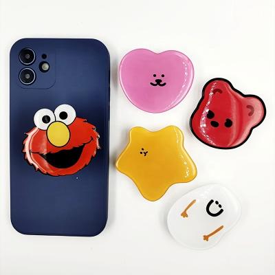 China Factory Supply Adjustable Glitter Height Mobile Phone Folding Stand With Free Customizable Popsoket Logo for sale