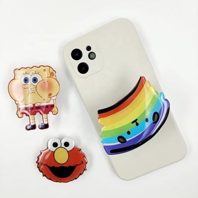 China Adjustable Size Factory Acrylic Grip Up Phone Holder Stand With Cute Design Logo Phone Finger Grip Custom Free for sale