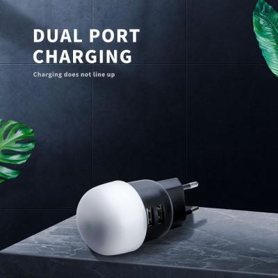 China Mobile Phone EU Plug AC DC 5V 2.1A 10W Can Be Luminous Mobile Phone Travel Wall Charger Usb Dual Port Charger for sale