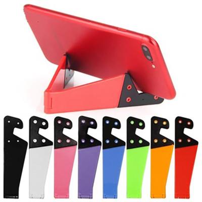 China Give Away Item Business Gift Hot Selling Easy Carrying V Shape Adjustable Mobile Phone Stand Cute Design Folding Bracket Stand For Phone for sale