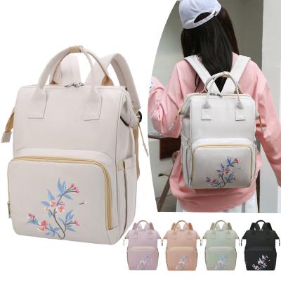 China Water Resistant Fashion Embroidery Mummy Bag Travel Outing Backpack Diaper Diaper Bags Maternal and Baby Products for sale