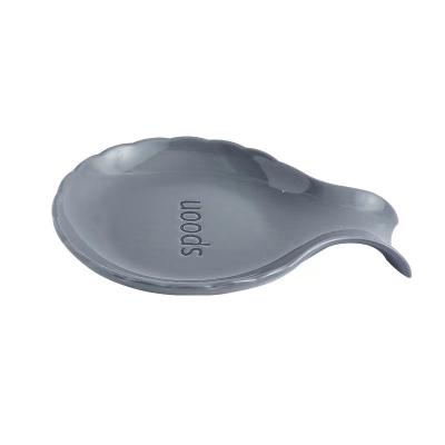 China New creative viable manufacturer spoon rest protection restaurant thickened ceramic spoon rest snack dish spoon holder for sale