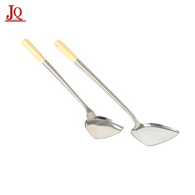 China Stainless Steel Stocked Fry Turner With Long Wooden Handle for sale